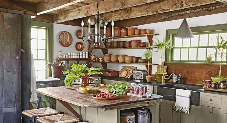 artwork or vintage items along kitchen cabinet-ceiling gap