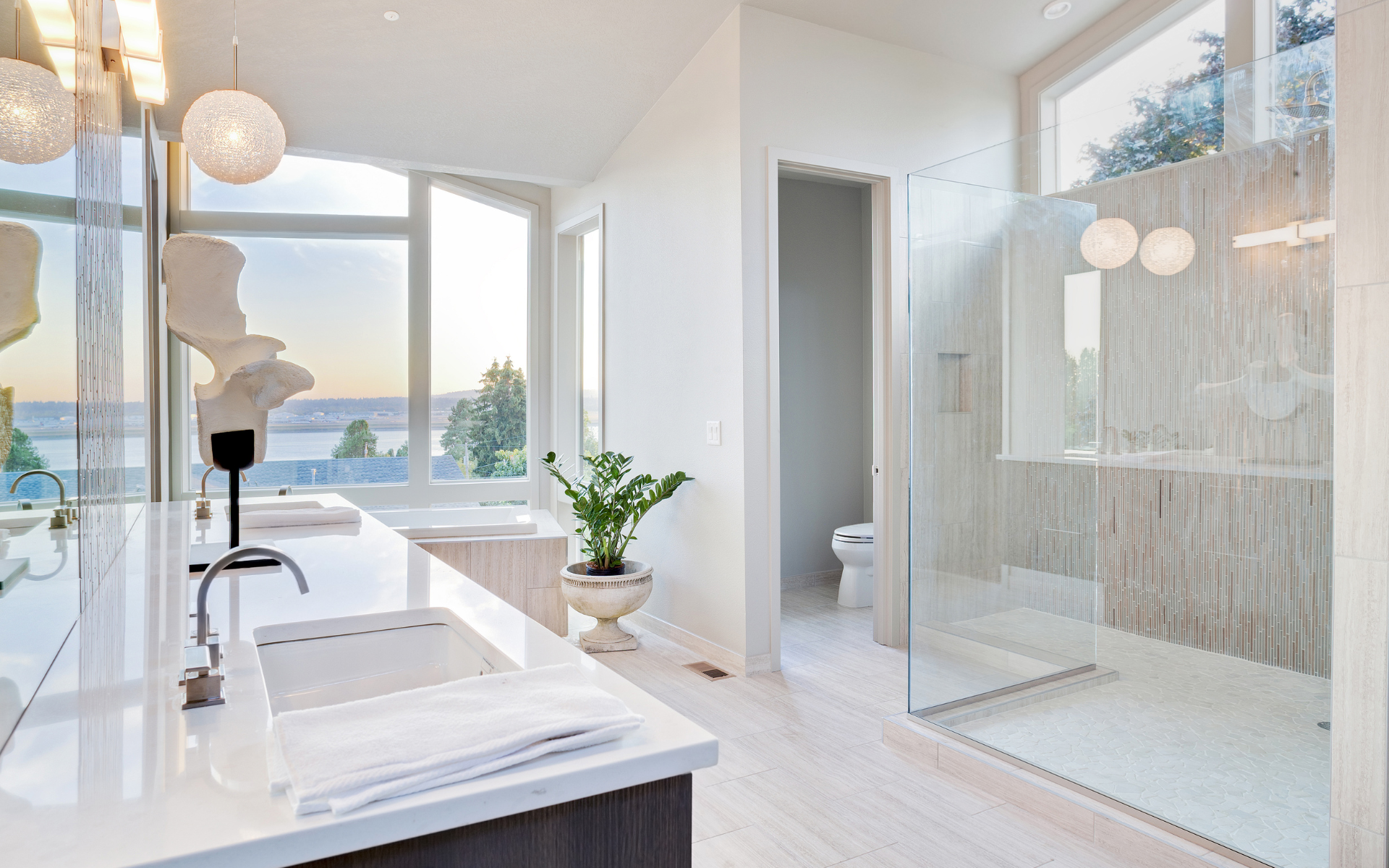 Stylish, modern bathroom with vanity, shower, tub, and toilet room