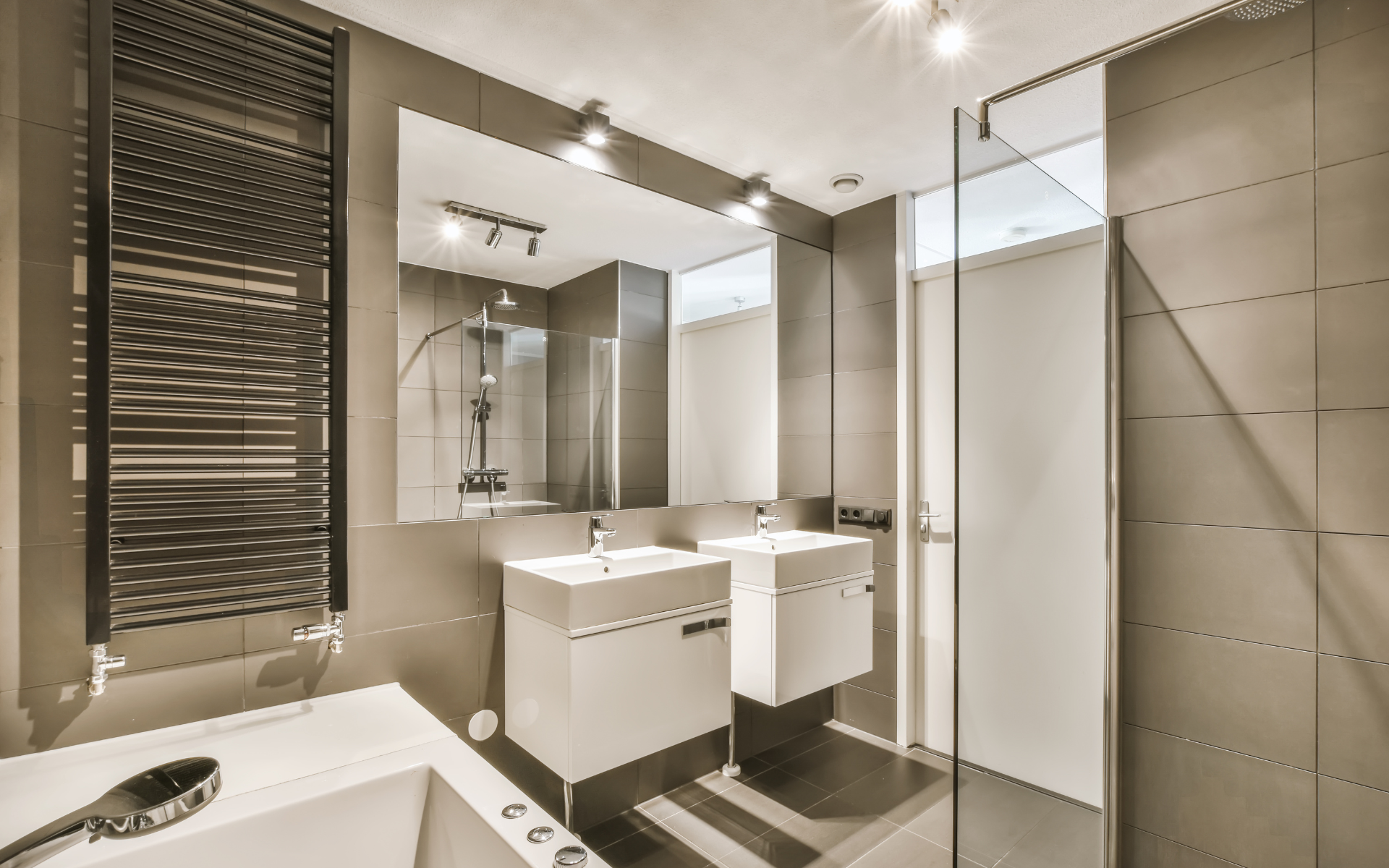 Modern bathroom with double floating vanity, tub and shower